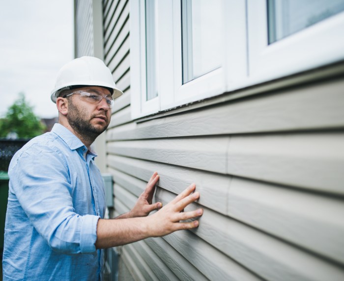Professional Installing and checking Siding Replacement in Eastern IOWA