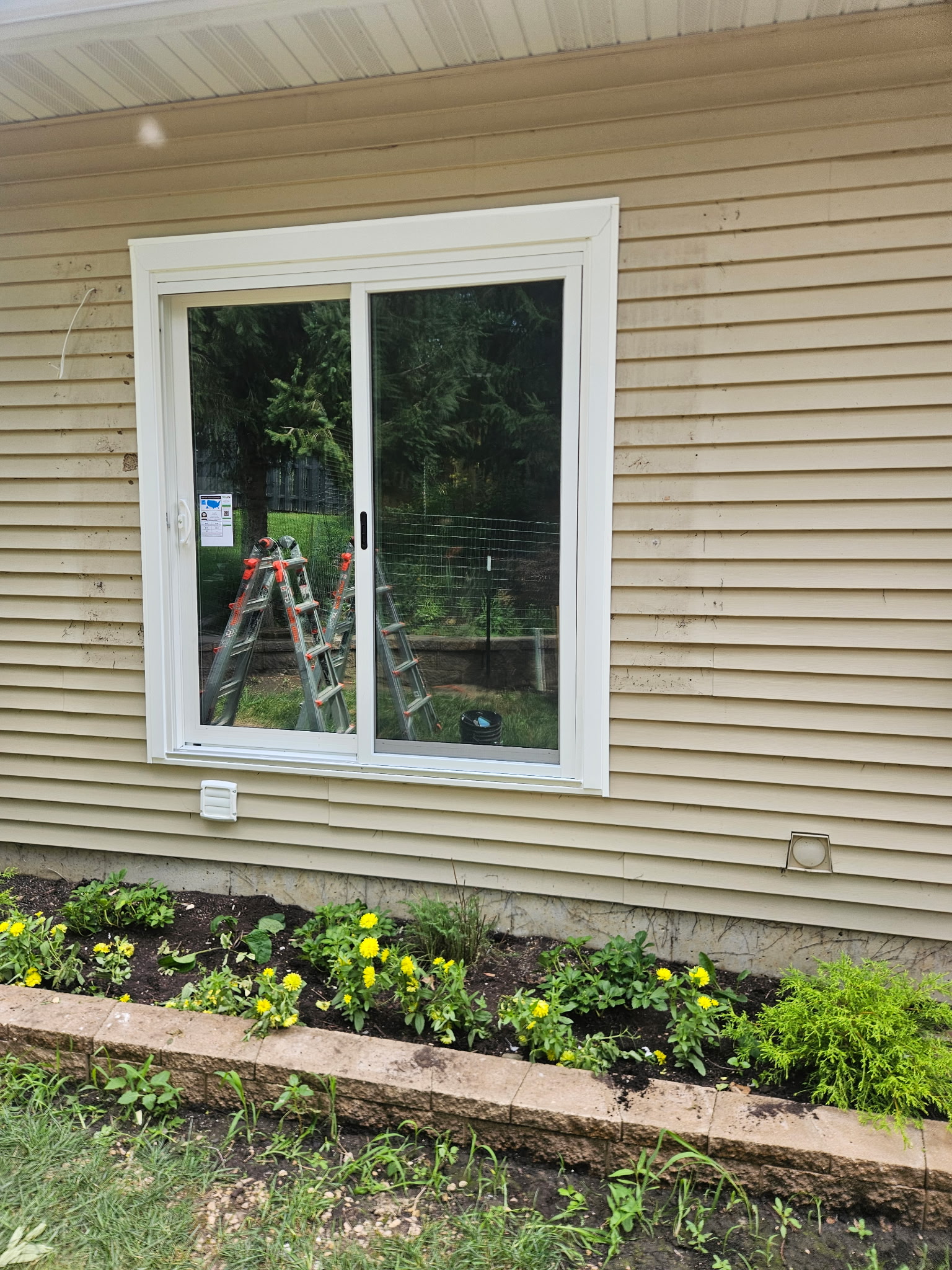 After: new white sliding glass door installed by Window Depot of Eastern Iowa in Cedar Rapids